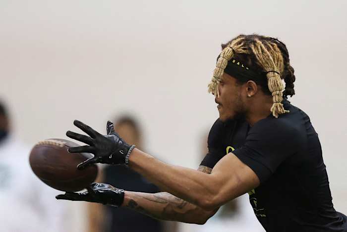 Nick Pickett catches a pass at Oregon's 2021 Pro Day at the Moshofsky Center in Eugene, Oregon.